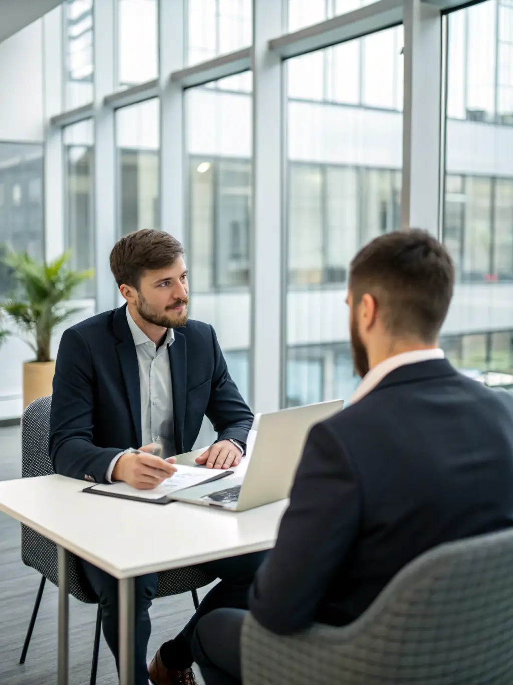 A professional team conducting a candidate interview in a modern office setting, symbolizing recruitment excellence.
